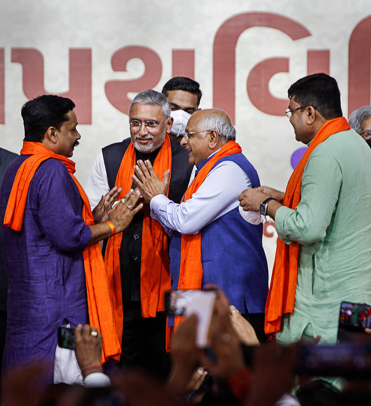 Gujarat CM Bhupendra Patel with newly sworn-in Cabinet ministers at their oath ceremony in Gandhinagar, Thursday, Sep 16, 2021.