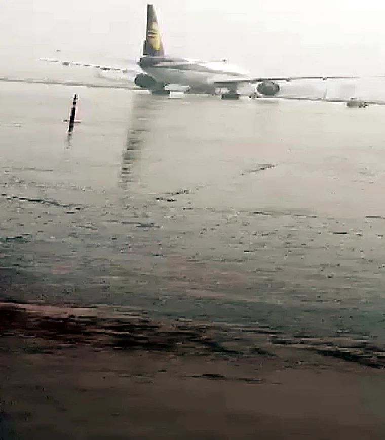 Waterlogging at Indira Gandhi International Airport (Terminal 3) after the national capital received heavy rainfall, in New Delhi on Saturday.
