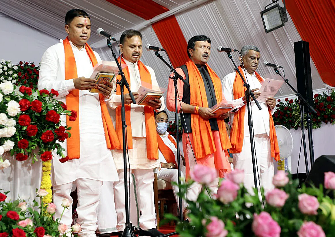Gujarat minister taking oath during the swearing-in ceremony, in Gandhinagar on Thursday.
