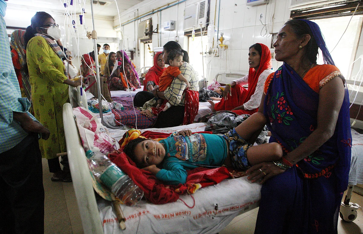Uttar Pradesh, Sep 04 (ANI): Children with their family members are seen inside an emergency ward, at a government hospital for children, in Prayagraj on Saturday.