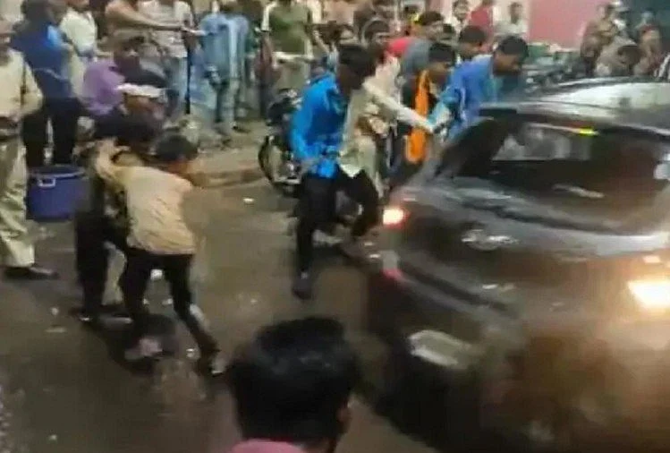 Watch video: Four injured after car rams into people during Durga idol immersion procession in...