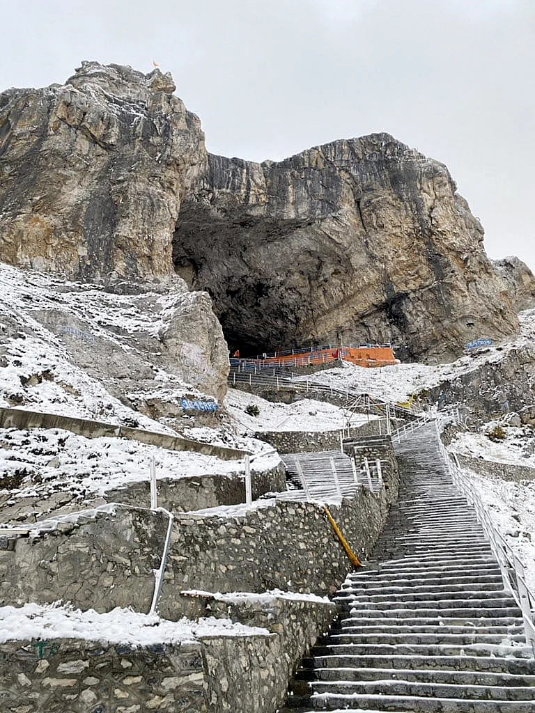 Amarnath Cave Temple receives fresh snowfall, in Anantnag on Monday.