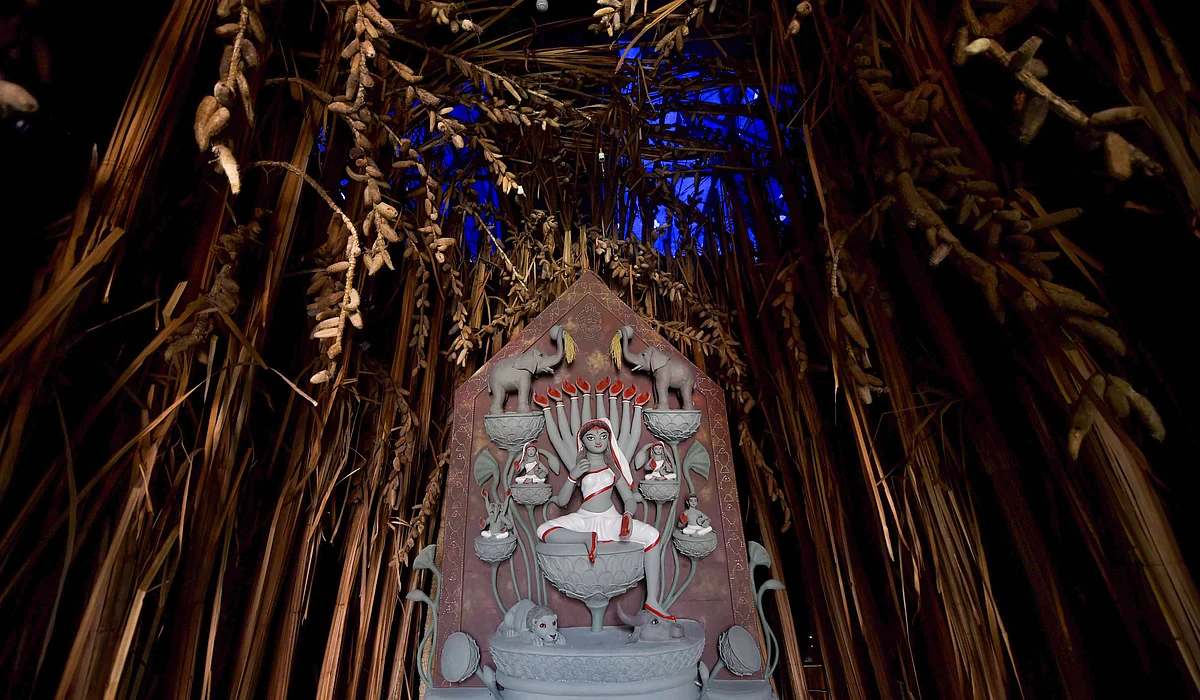 An idol of Goddess Durga at an under construction community pandal, ahead of Durga Puja Festival in Kolkata, Tuesday, Oct. 5, 2021.