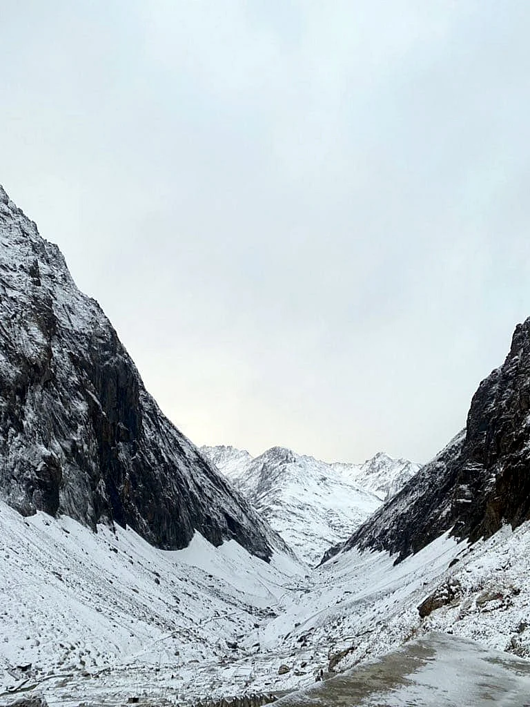 Amarnath Cave Temple receives fresh snowfall, in Anantnag on Monday.
