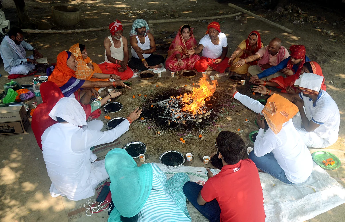 Devotees perform Hawan on the occasion of Ram Navami festival (Last day of Navratri), at Vindhyachal Dham, in Mirzapur on Thursday