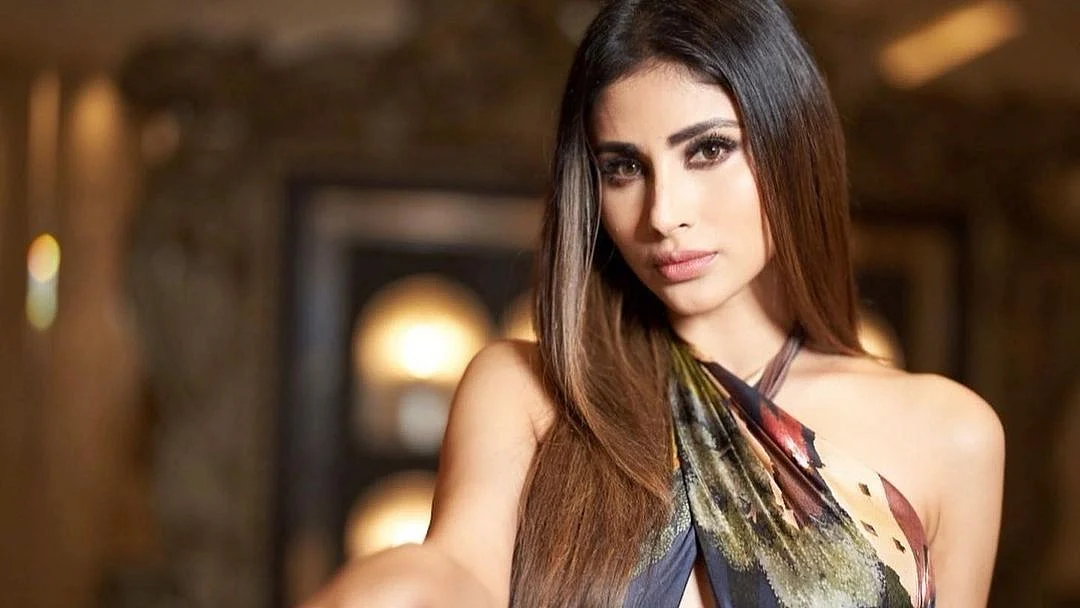Photos: Mouni Roy styles Rs 14,000 silk floral scarf as a sexy halter top for latest photoshoot