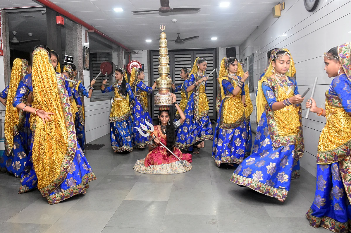 Artists rehearse traditional Gujarati Garba dance for the upcoming Navratri festival celebrations, in Surat on Tuesday.