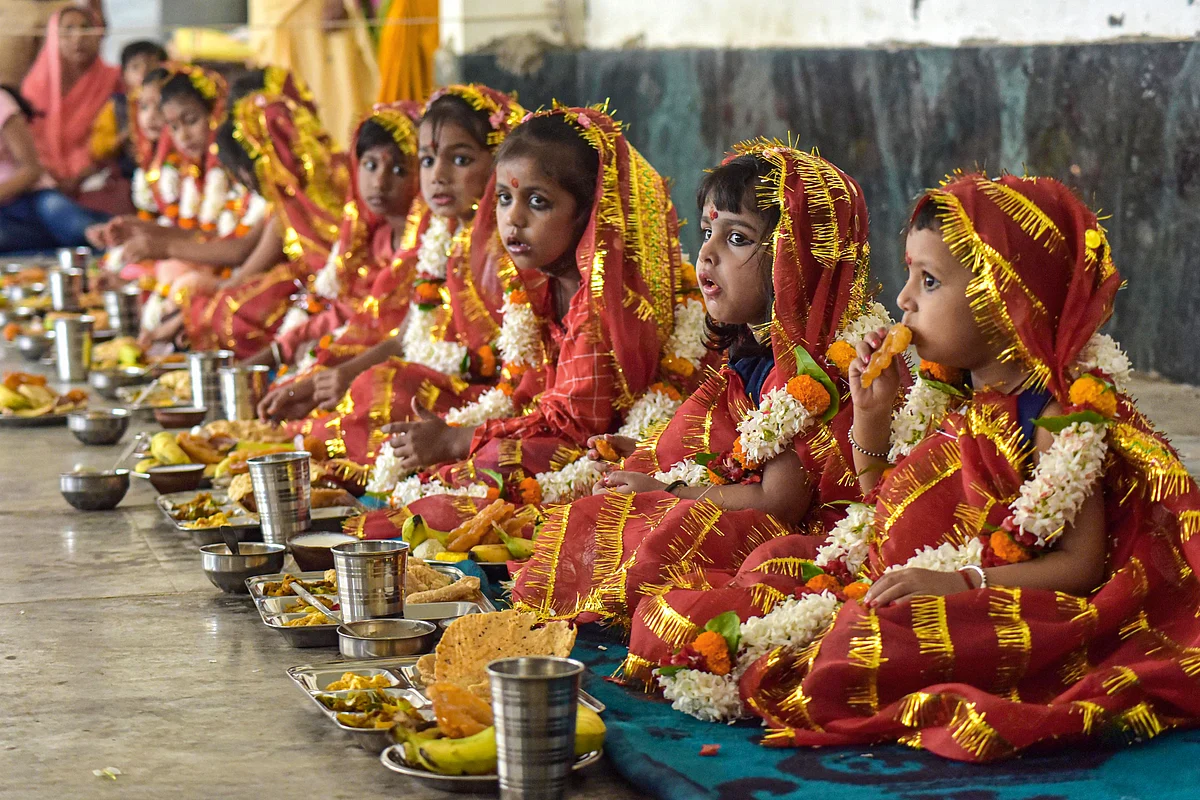 Varanasi: Girls during the last day of the Navratri festival celebration at Kinram Ashram in Varanasi, Thursday, Oct. 14, 2021