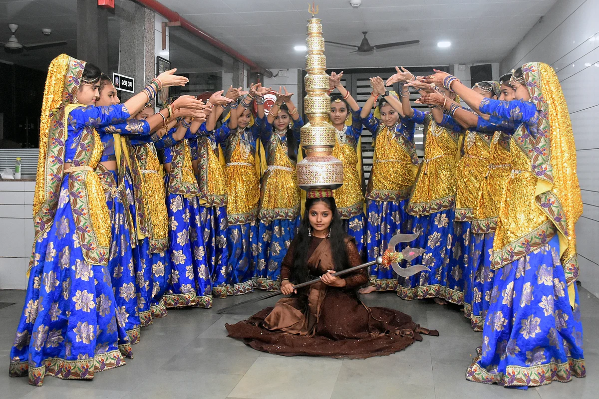 Artists rehearse traditional Gujarati Garba for the upcoming Navratri festival celebrations, in Surat on Tuesday.