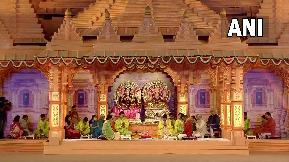 Diwali 2021: Delhi CM Arvind Kejriwal, his wife Sunita take part in puja event at Thyagraj Stadium