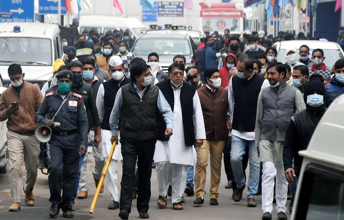 Bhopal: Lathi-wielding Congmen escort Diggy as arrives to inaugurate Covid-19 ICU ward at JP...