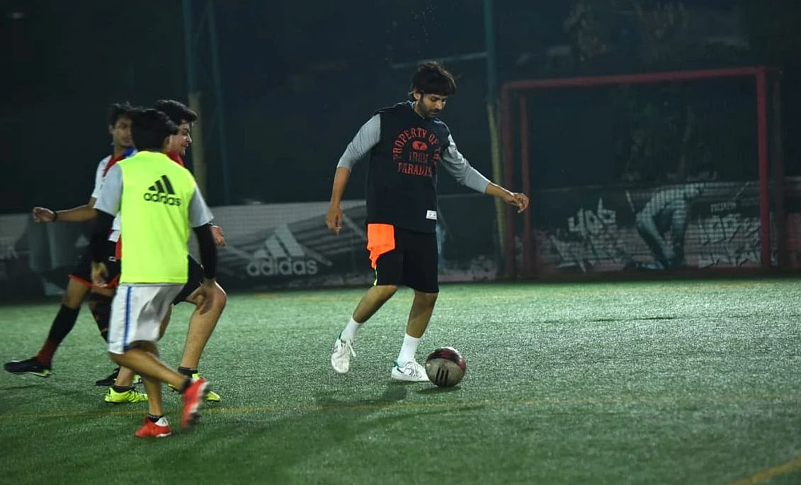 Watch: Kartik Aaryan meets fans after football match, requests them to wear masks amid rising...