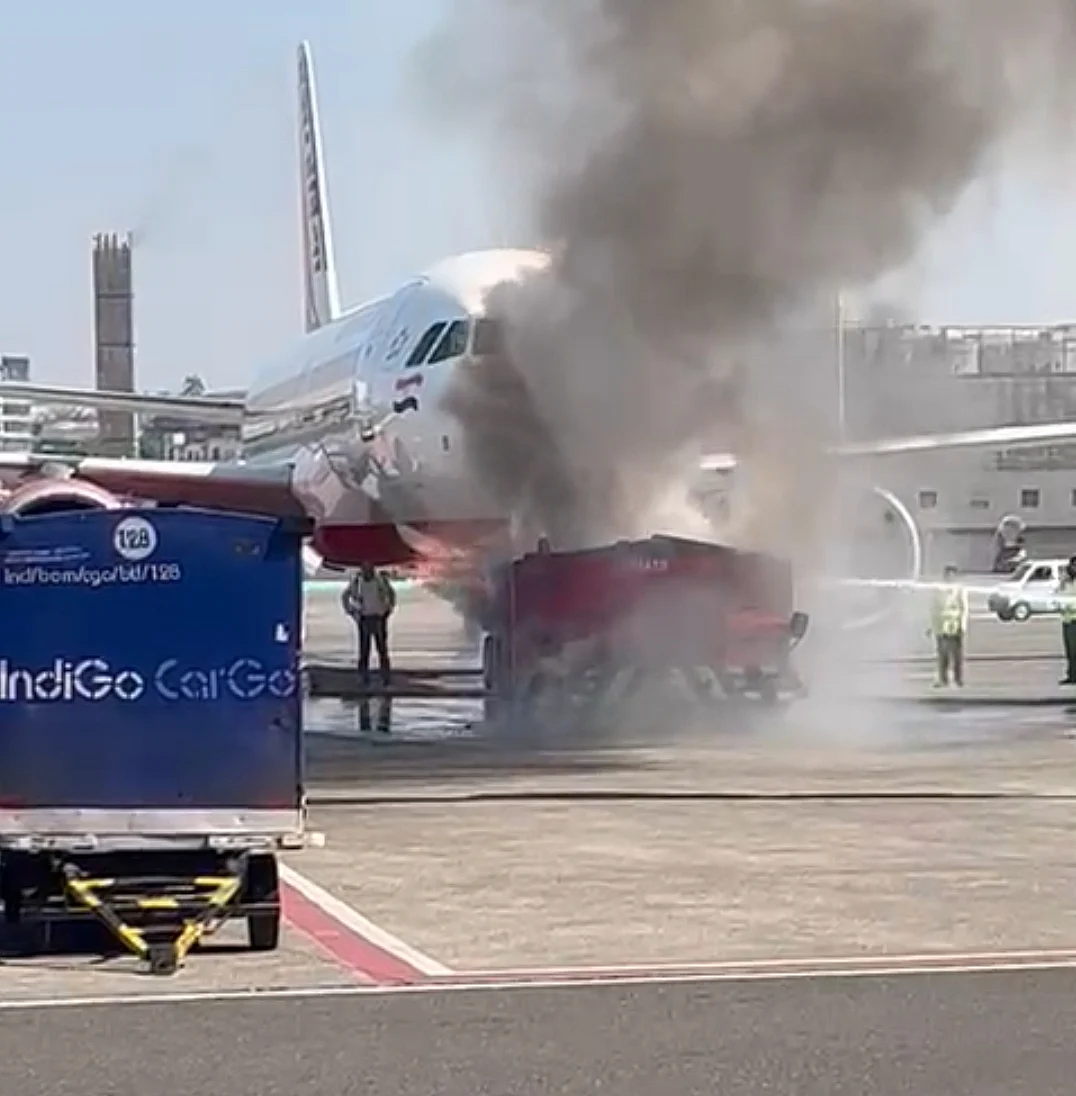 Mumbai: Air India-647 flight's pushback tow tug catches fire at CSMIA, no injuries reported