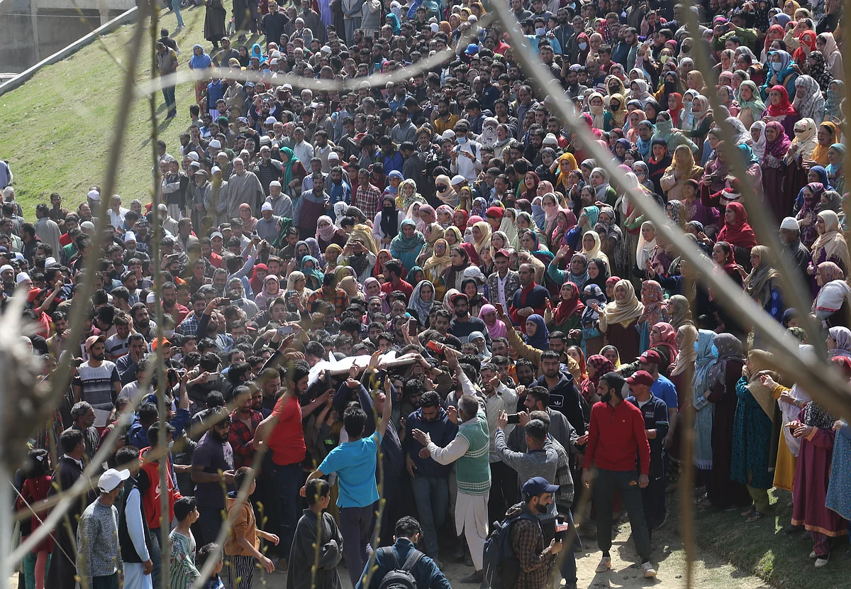 Kashmiri Villagers attend funeral of slain policeman and his brother at Chattabugh village of central Kashmirs Budgam district killed in terrorist attack