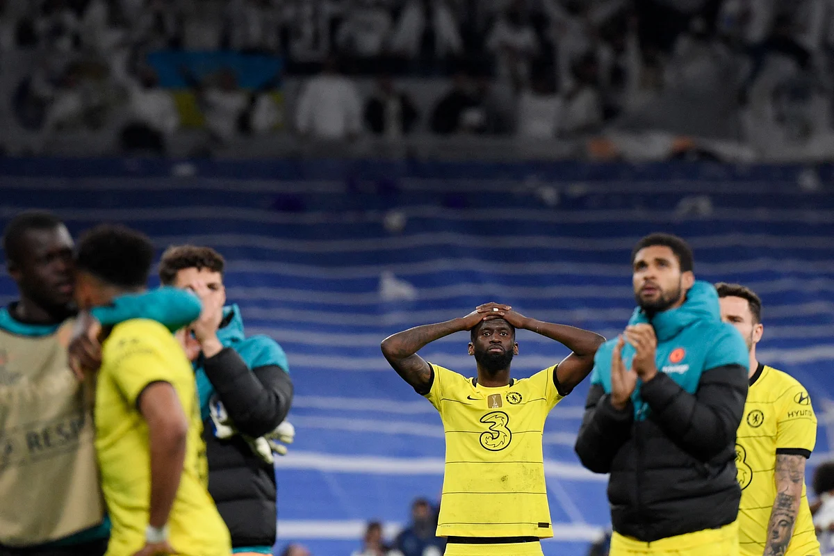Chelsea players wear a disappointed look