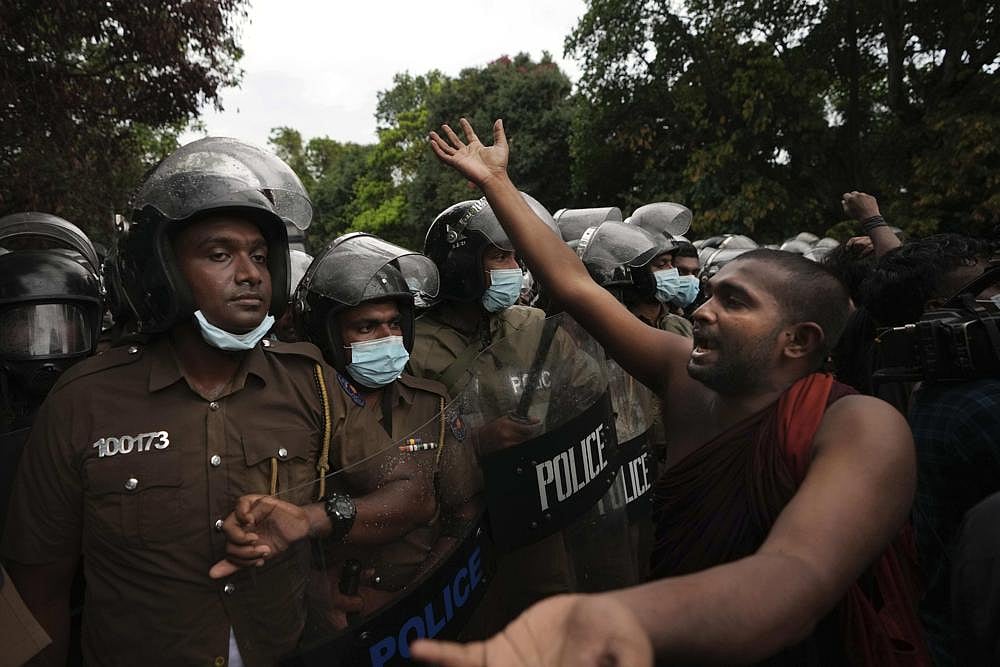 Sri Lankan protesters find millions of rupees from Gotabaya Rajapaksa's house - Vimarsana News