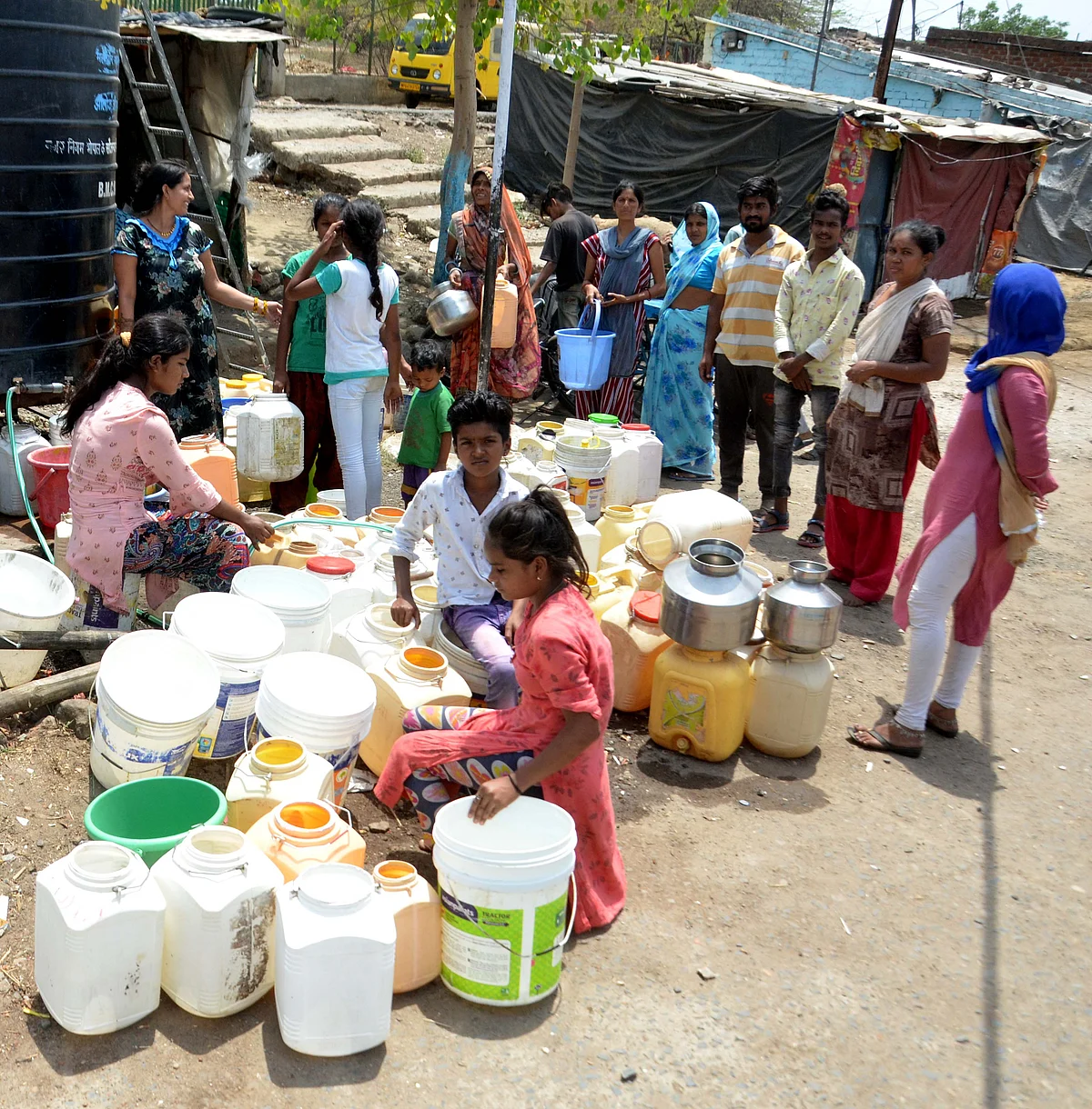 People crowding to fill their vessels as water supply remained disrupted in many parts of Bhopal for the fourth consecutive day on Sunday due to laying of new Kolar pipeline.
