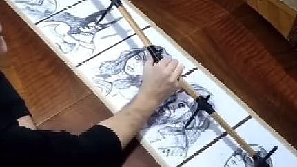 Watch: How does this artist skectch 5 superhero portraits at the same time? - Vimarsana News