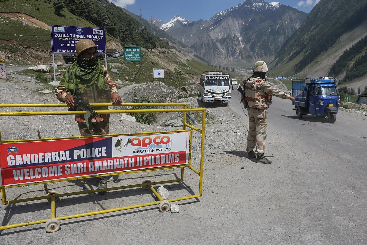 Paramilitary forces stand alert inside the Bank at Sonmarg, ahead of the Hindu pilgrimage to the holy cave shrine of Amarnath.