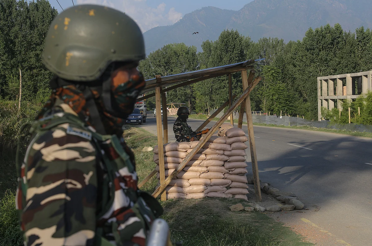 Security personnel stand guard at a checkpoint in Amarnath Base camp in Sonmarg, ahead of the Annual Hindu pilgrimage to the holy cave shrine of Amarnath.