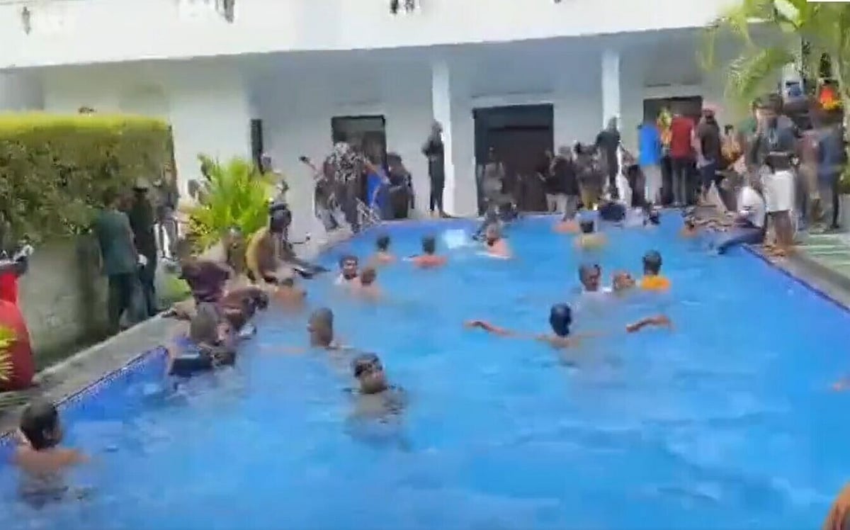Sri Lanka Crisis: Protesters storm President Gotabaya Rajapaksa's home, take dip in swimming pool; here's what we know so far - Vimarsana News