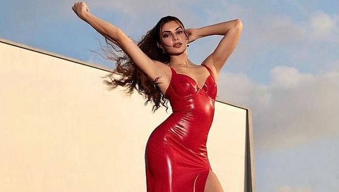 Jacqueline Fernandez is a diva to look out for in a hot red high slit dress - Vimarsana News