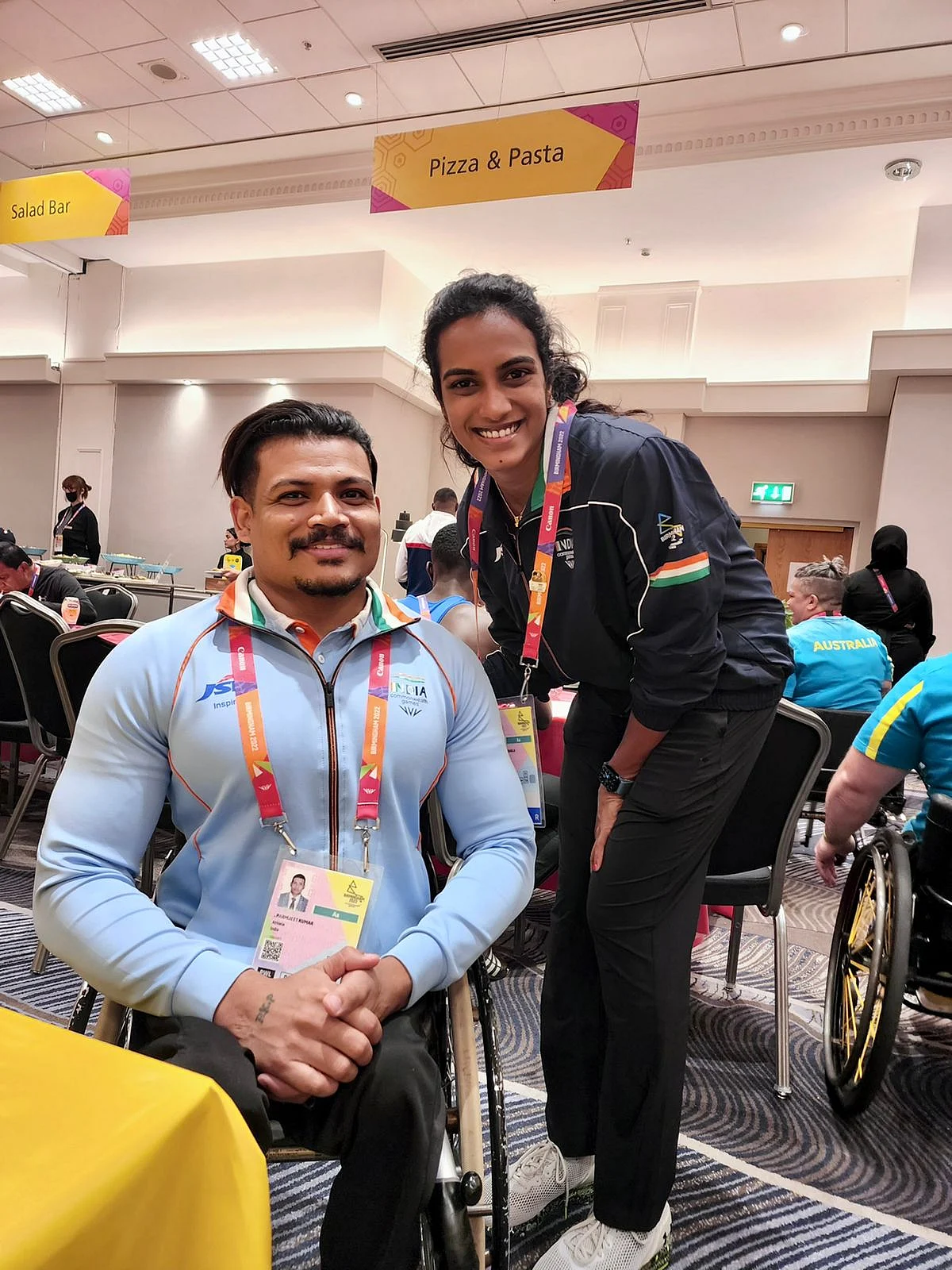 PV Sindhu with para-powerlifter Paramjeet
