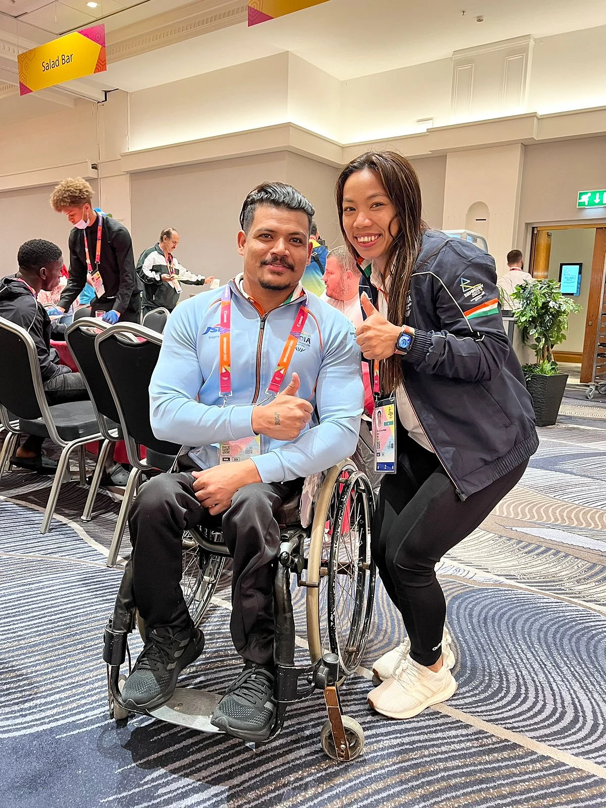 Mirabai Chanu with para-powerlifter Paramjeet