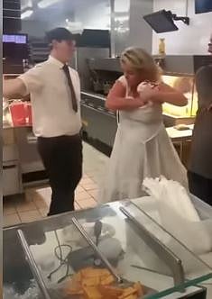 WATCH: London woman caught on tape stuffing her dress with McDonald's burgers, abusing staff - Vimarsana News