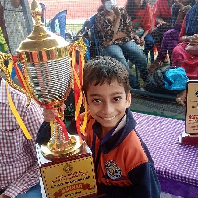 One of the youngest participants Vyom Saraf after winning the overall category trophy and the individual silver medal