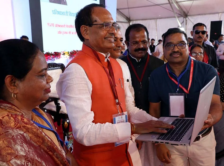 With one click Rs 25K was transferred in accounts of 91,498 meritorious students for laptops