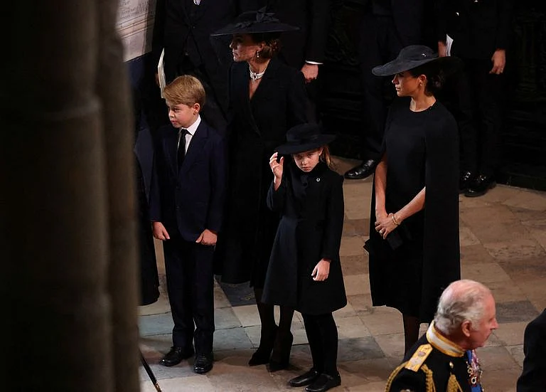 Princess Charlotte wore a brooch in the shape of a horsheshoe.