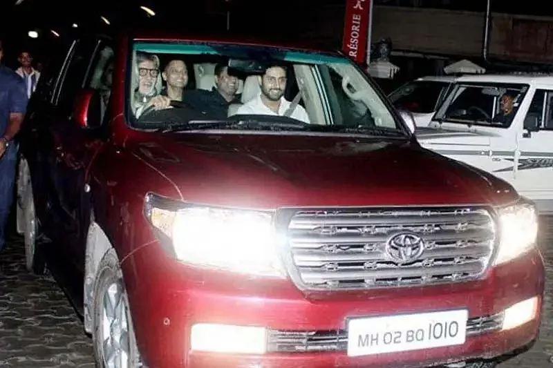 Amitabh Bachchan and Abhishek Bachchan in Toyota Land Cruiser