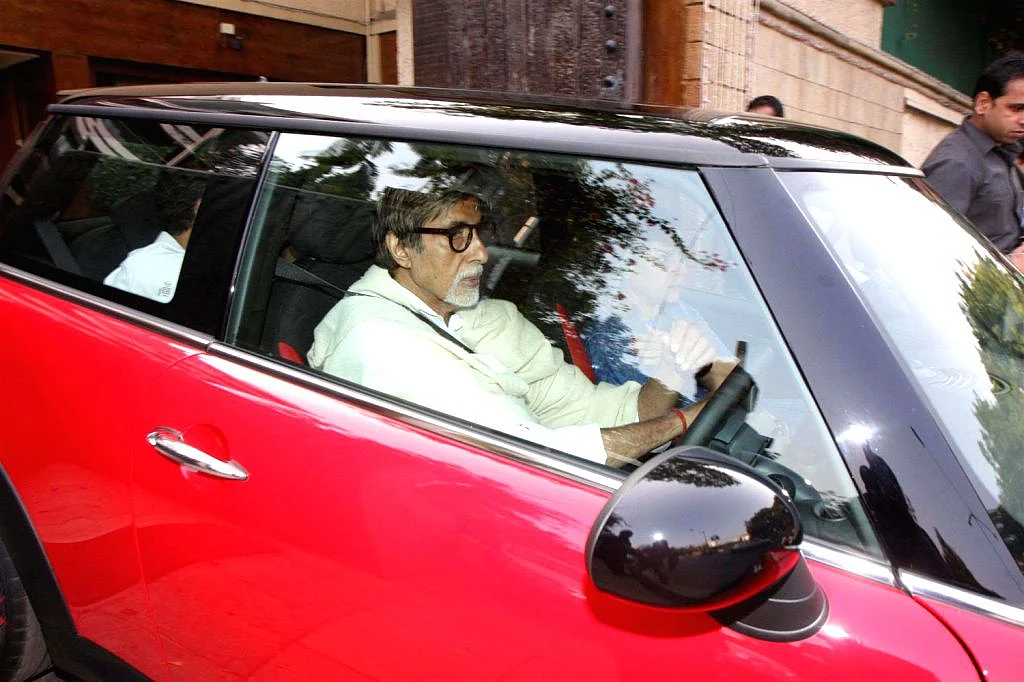 Amitabh Bachchan leaving his home in his Mini Cooper S