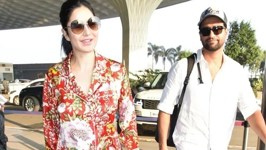 Watch: Katrina Kaif jets off with Vicky Kaushal for New Year in red floral pyjamas - Vimarsana News