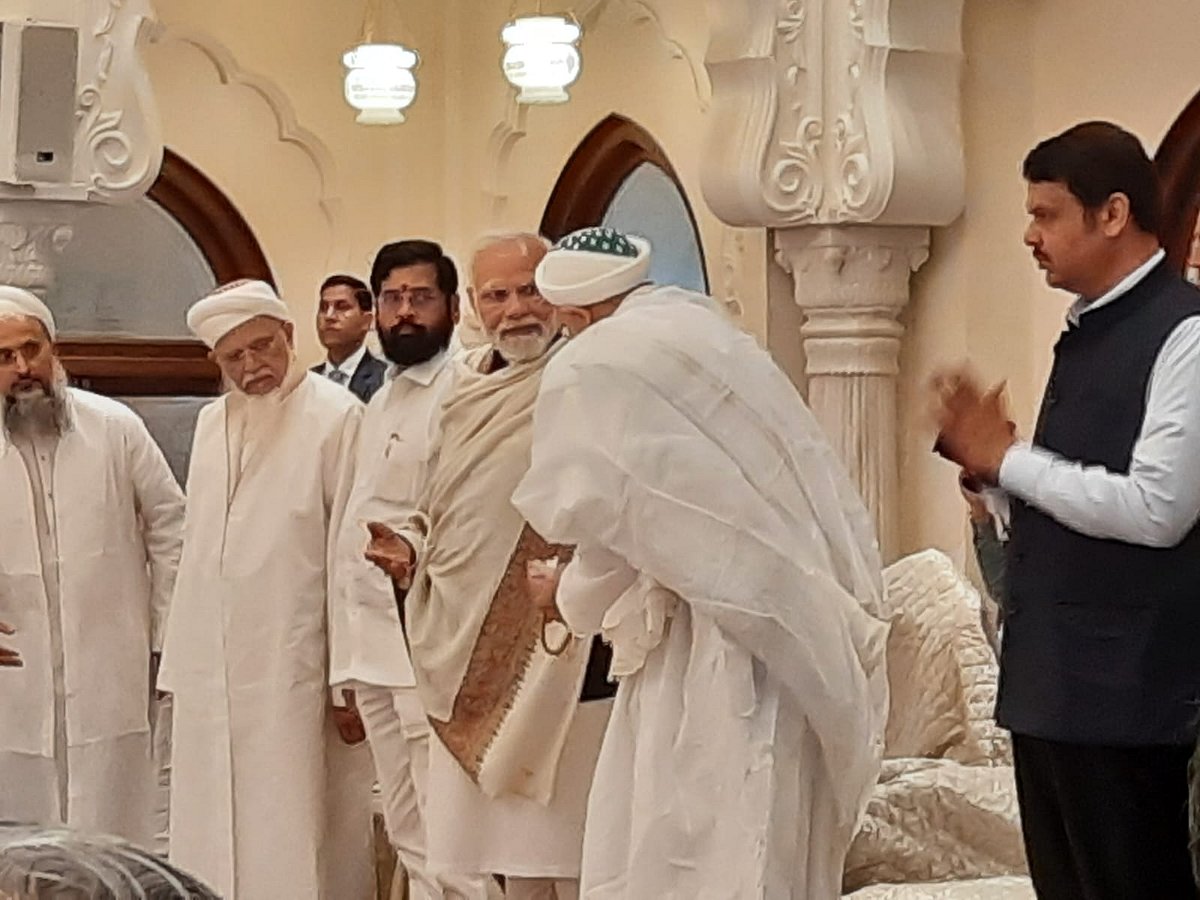 PM Modi honoured with shawl before leaving