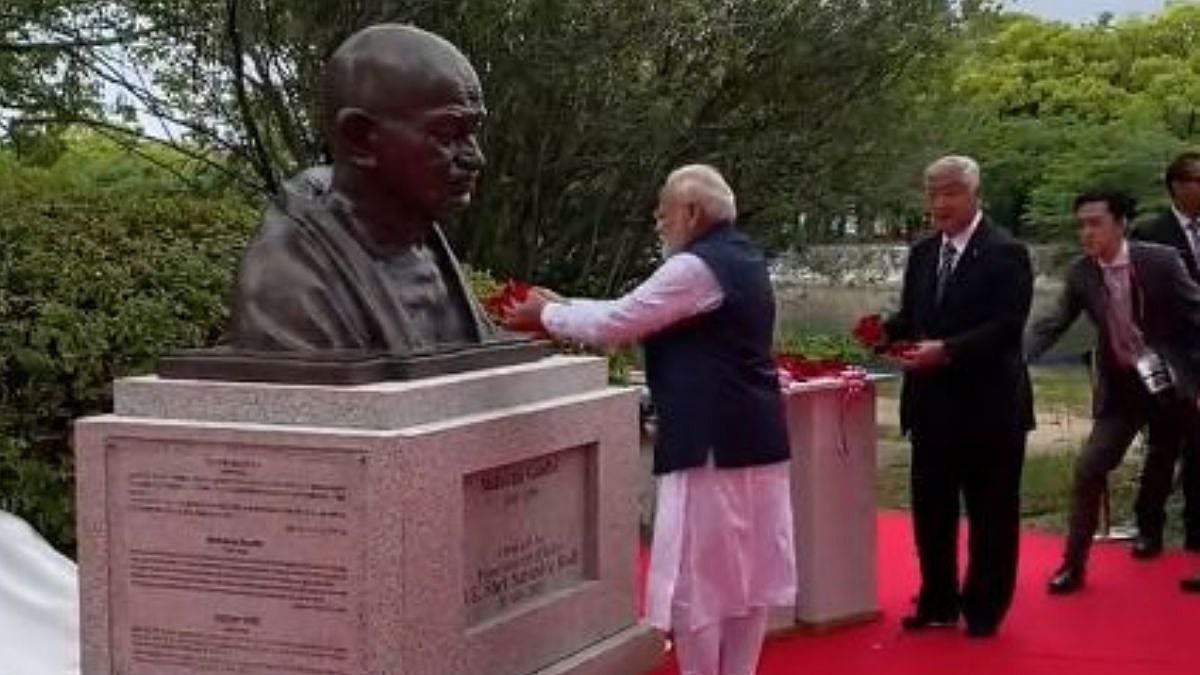 Modi Gandi PM Modi unveils bust of Mahatma Gandhi in Japan's Hiroshima, says it ...