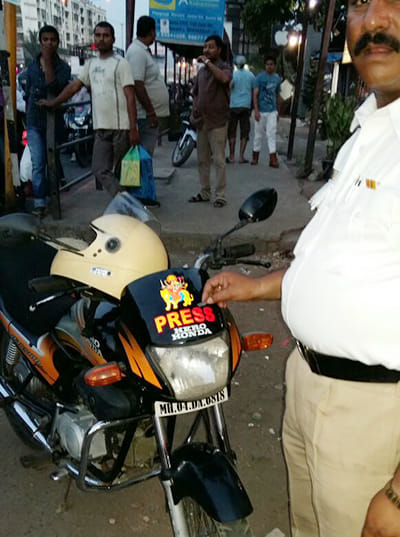 press, police' tags under cops' scanner