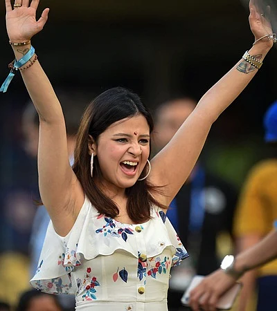 Hyderabad: Sakshi Dhoni, wife of CSK skipper MS Dhoni cheers before the start of Indian Premier League 2019 final cricket match between Chennai Super Kings (CSK) and Mumbai Indians (MI), at Rajiv Gandhi International Cricket Stadium, in Hyderabad, Sunday, May 12, 2019. (PTI Photo/R Senthil Kumar)