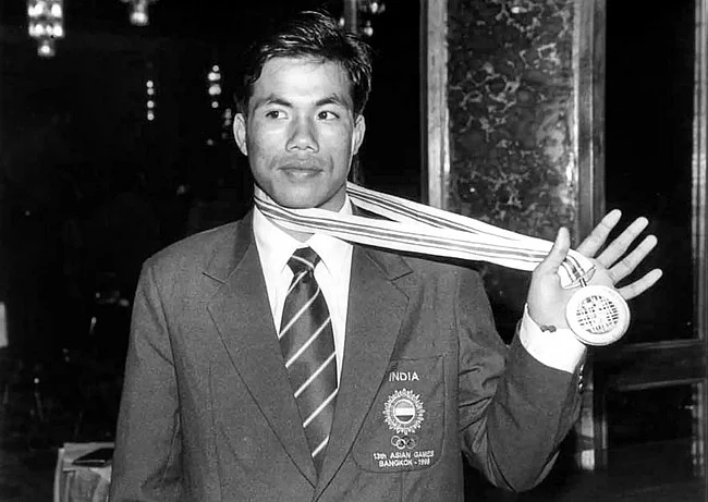 Dingko Singh winning the gold medal in 1988