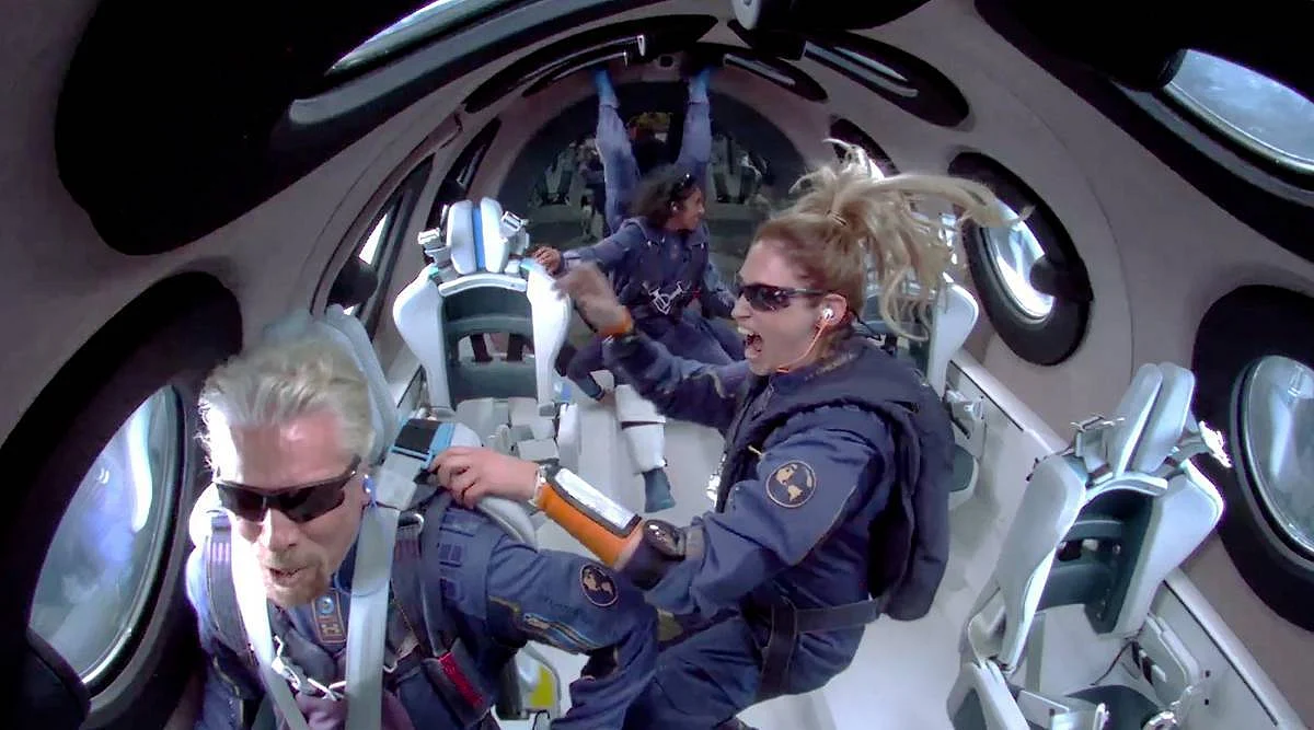 This is a still from a video inside the cockpit showing the crew celebrating