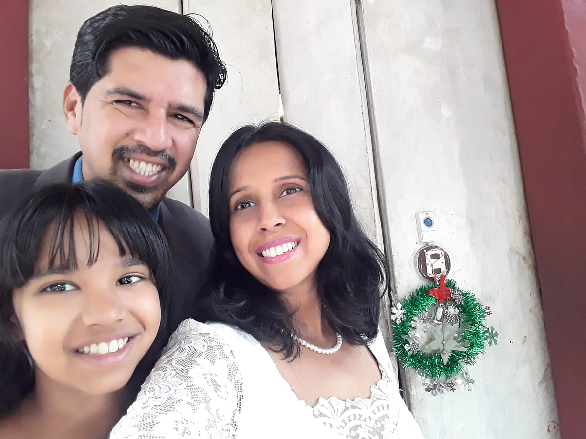 Martina Sequeira e Souza with her husband and daughter