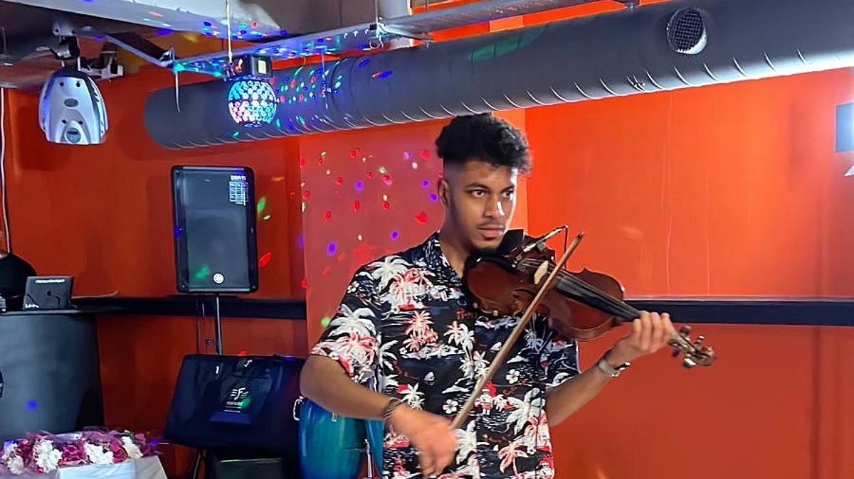 Joanro Gomes plays the violin at the WGD 2022 programme at Hounslow in the UK.