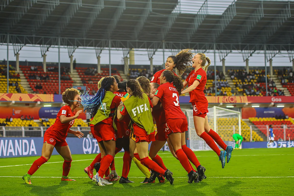 The Canadian girls exult after the first goal.
