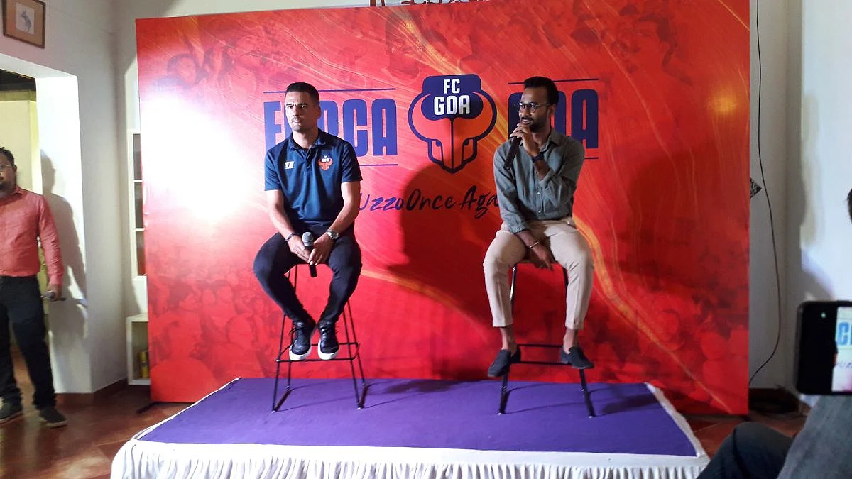 FC Goa coach Carlos Pena (left) and team director Ravi Puskur address press persons at meet the players and coach programme at Dona Paula on Tuesday.