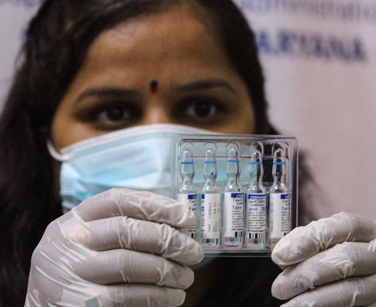 A medic shows a vial of the Sputnik V coronavirus vaccine during its launch, in Gurugram, Saturday, July 10, 2021. (PTI)