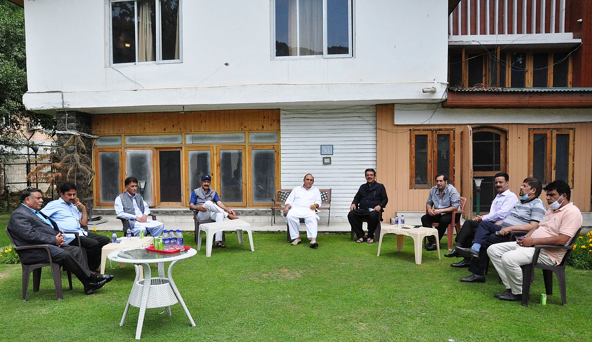 Sajad Lone chairing a meeting of Peoples' Conference leaders to discuss the all-party meet called by PM Modi.