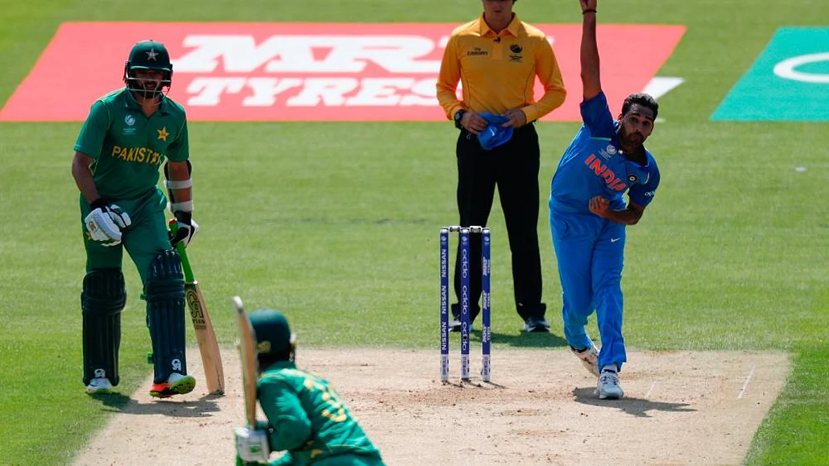 Indian fast bowler Bhuvneshwar Kumar bowling to Pakistan's opener Fakhar Zaman during ICC Champions Trophy, 2017 Final in England.