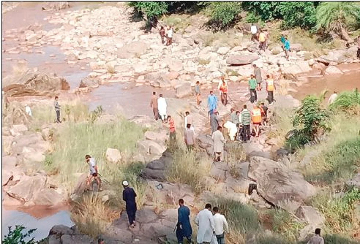 Woman washed away in flash floods