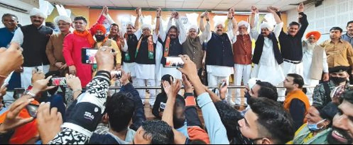2 former NC legislators among dozen leaders join BJP